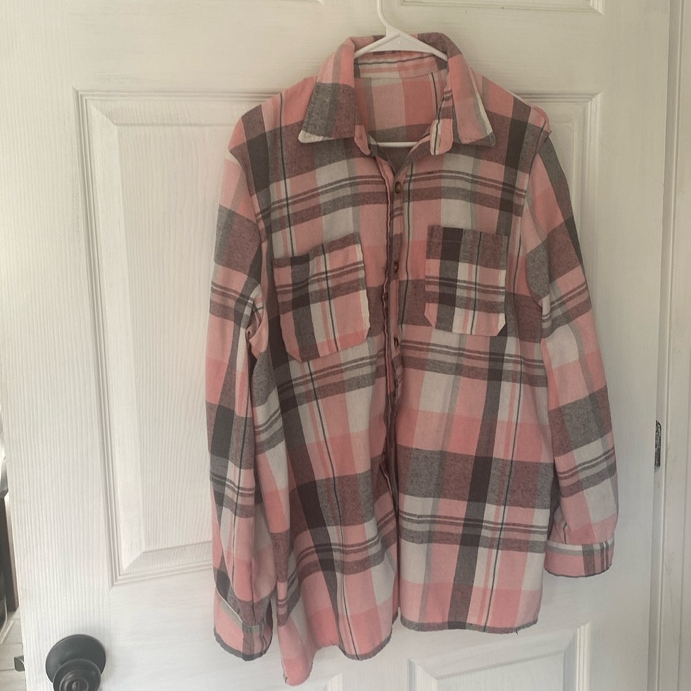 New Pink and gray plaid flannel. Size XXL. Very soft. Washed but never wore